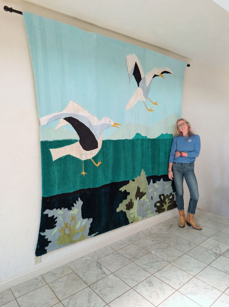 Margaret Timbrell with her tapestry Blue Gulls